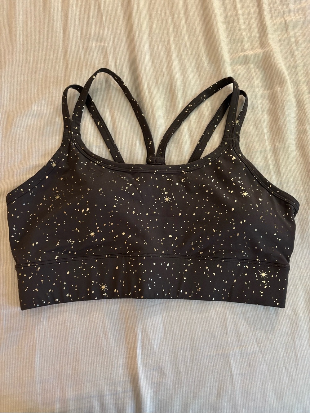 NWOT Fabletics Black Sports Bra with Gold Star Pattern